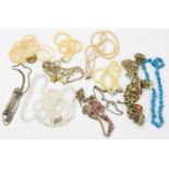 A small collection of costume jewellery including necklaces and fobs.