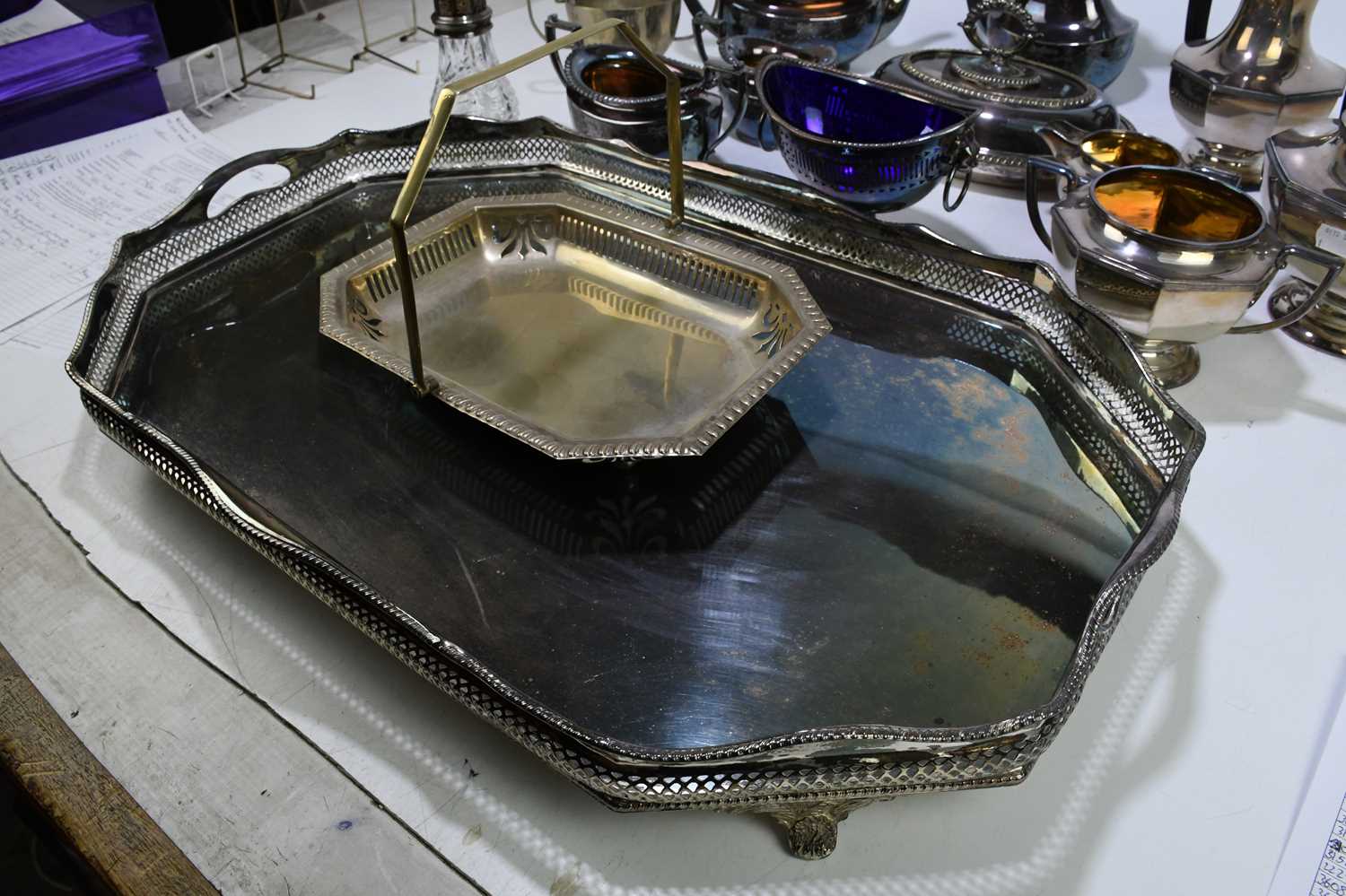 A pierced silver plated twin handled galleried tray, length 60cm, with an Art Deco four piece silver - Image 2 of 5