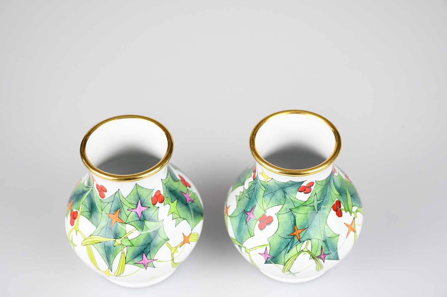 MOORCROFT; a pair of baluster shaped vases decorated in the 'Christmas Lights' pattern, height 6.5cm - Image 2 of 4