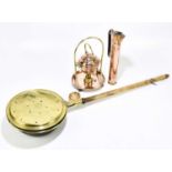 A small group of copper and brass items to include a copper spirit kettle, a copper jug, a brass