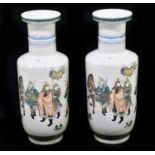 A pair of late 19th/early 20th century Chinese Famille Verte vases, decorated with figures, horses