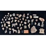 A collection of Javanese terracotta fragments, possibly 14th century, incluting animal and human