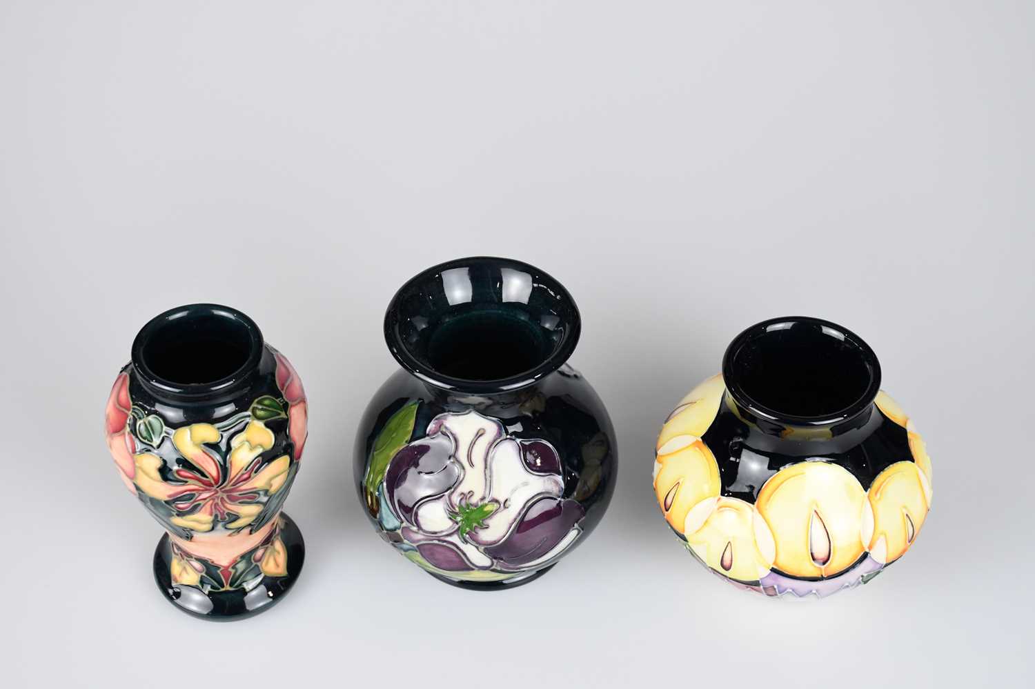 MOORCROFT; three small vases, including an example decorated in the 'Oberon' pattern, height 10cm. - Image 2 of 5