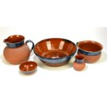 DUXHURST; a five piece terracotta wash set, with glazed top.Condition Report: All with crazing to