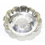 ROYAL IRISH SILVER; a hallmarked silver pin dish with shaped rim, inscribed 'J.W. Henn', Dublin