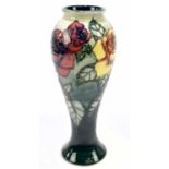 SALLY TUFFIN FOR MOORCROFT; a meiping shaped limited edition vase decorated in the 'Rose and Bud'