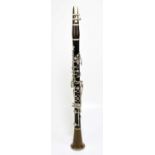 A Boosey & Hawkes '77' clarinet, cased.