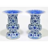 A pair of Chinese porcelain blue and white vases decorated with lotus flowers, with seal mark to the
