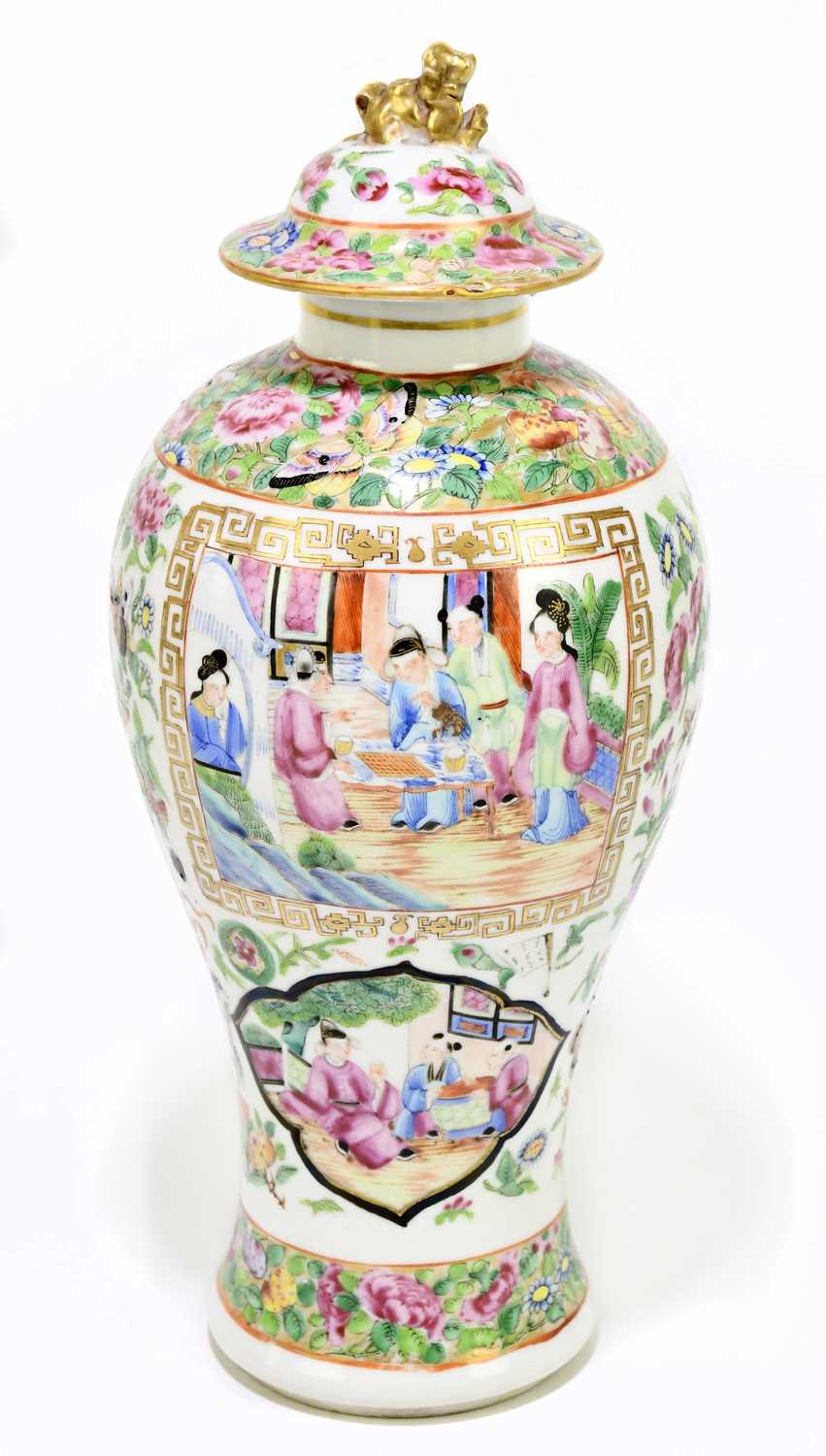 A 19th century Chinese Canton Famille Rose jar and cover decorated with figures inside panels,