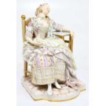 MEISSEN; a porcelain figure of a maiden seated in a chair and dreaming of her love, with a love