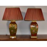 A pair of modern gilt and floral table lamps and pleated shades (2)