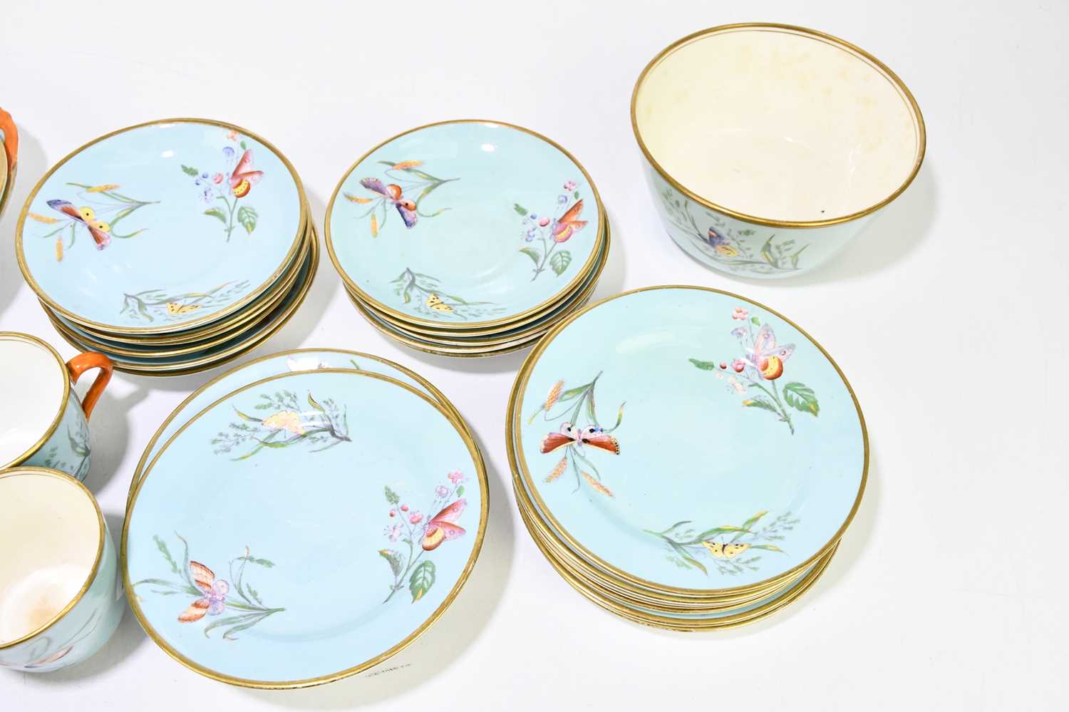 A 19th century English bone china thirty-eight piece part tea service, decorated with butterflies - Image 3 of 9