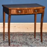 A reproduction mahogany bow front side table, with two drawers, height 74cm, width 75cm.