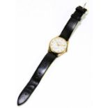 GARRARD; a 9ct gold gentleman's wristwatch, the silvered dial set with Arabic numerals and