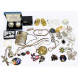 A collection of assorted costume jewellery to include assorted necklaces, silver necklaces, a