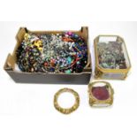 A large collection of costume jewellery, mostly necklaces, various styles, with two modern gilt