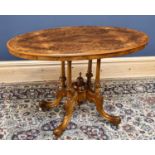 A Victorian walnut and inlaid oval loo table, height 68cm, width 107cm, depth 61cm.