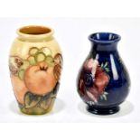 SALLY TUFFIN FOR MOORCROFT; a cylindrical vase decorated in the 'Finches Ochre' pattern, height 10.