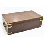 A 19th century brass bound mahogany campaign writing slope, the hinged cover enclosing baize