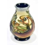 PHILIP GIBSON FOR MOORCROFT; a squat baluster vase decorated in the 'Trout' pattern, height 10cm.