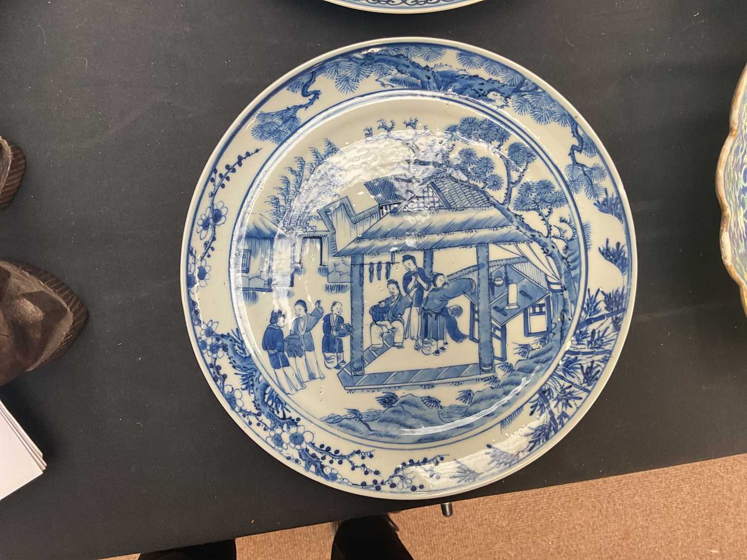 Two 19th century Chinese blue and white plates of circular form to include an example decorated with - Image 7 of 10