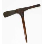 PAPUA NEW GUINEA: a double sided axe, height 45cm, length 53cm.