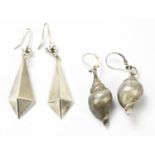 A pair of silver shell earrings, stamped 925, together with a pair of kite shaped earrings, also