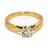 A yellow metal Illusion set diamond solitaire ring, .10ct, approx size M, approx weight 3g.