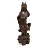 A Japanese carved wood figure of Guanyin, height 48cm.