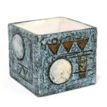 SIMONE KILBURN FOR TROIKA POTTERY; a small cube decorated to each side with stylised detail on a