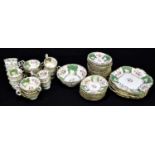 A 19th century Rockingham style fifty piece part tea service, comprising four sandwich plates,