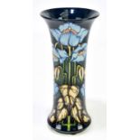 PHILIP GIBSON FOR MOORCROFT; a Moorcroft Collector's Club cylindrical with flared neck, decorated in