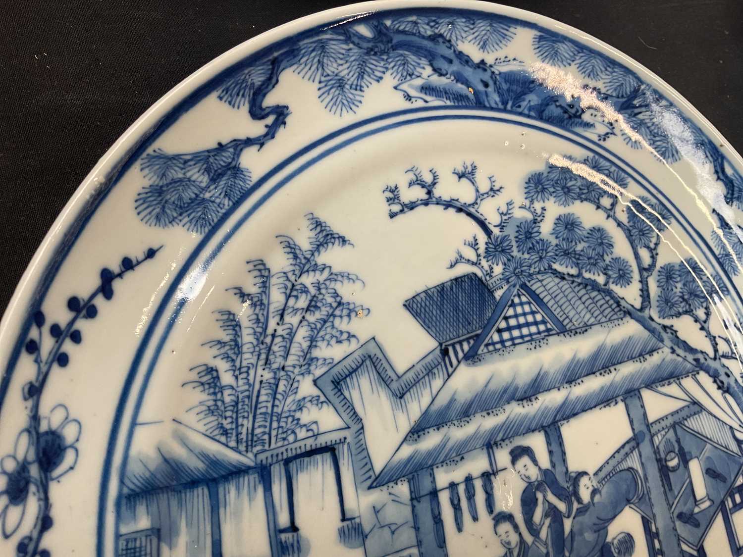 Two 19th century Chinese blue and white plates of circular form to include an example decorated with - Image 8 of 10
