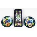 MOORCROFT; two circular pin dishes produced for the Moorcroft Collector's Club, 205, diameter