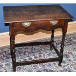 An 18th century oak lowboy, with single drawer, on turned legds, height 68cm, width 73cm, depth