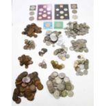 A quantity of assorted coins to include commemorative crowns, half crowns, florins, silver