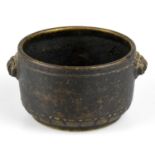 A 19th century Chinese bronze censer, with twin handles and cast detailing, six character mark to