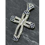 A 9ct white gold cross pendant set with paste white and blue stones, length 4.5cm, gross weight 4g.
