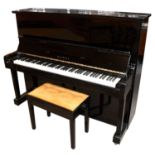 KAWAI; a model BL-12 polished ebony upright piano, height 123cm, depth 61cm, length 152cm,