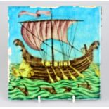 WILLIAM DE MORGAN; an Art Pottery tile painted with a galleon ship and five sailors with paddles,