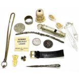 A small assortment of collectors' items to include a police whistle, a button hook, a Hornby railway