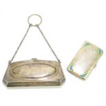 J & R GRIFFIN; a George V hallmarked silver purse of shaped rectangular form, with cast beaded