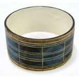 ALISON BRIDGEN FOR TROIKA POTTERY; a drum bowl decorated with a single band of circles with linear