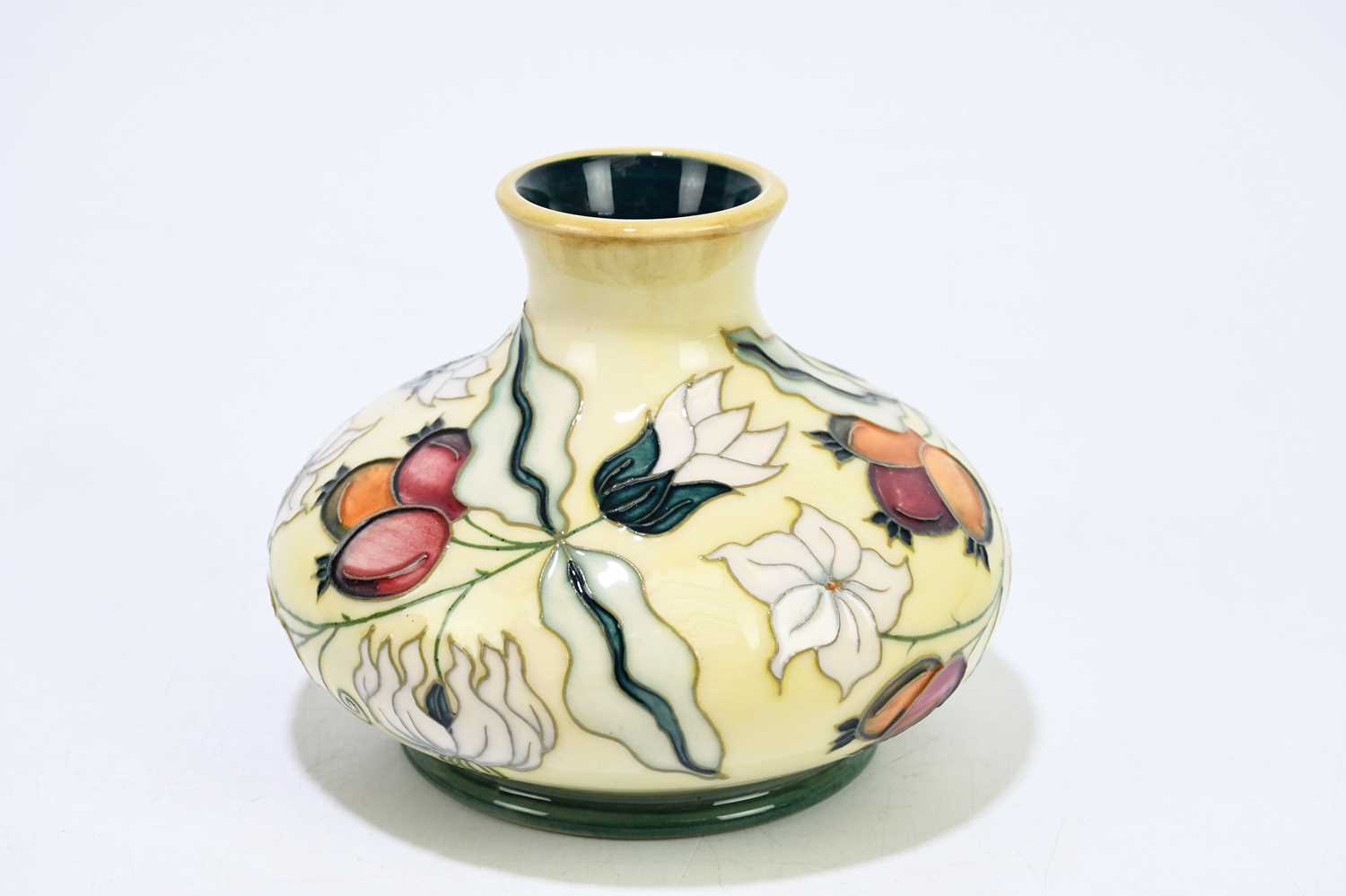 MOORCROFT; a squat vase decorated with floral sprays on an ivory ground, height 10cm.Condition - Image 3 of 6