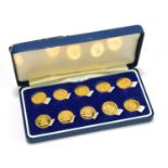 A collection of ten King Edward VIII commemorative 9ct gold 'half sovereign' pattern coins, dated