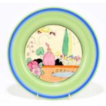 CLARICE CLIFF; a hand painted circular plated decorated in the 'Crinoline Lady' pattern, diameter