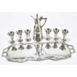 ATTRIBUTED TO NORBLIN BROTHERS; a Polish Art Nouveau eight piece drinking set on shaped