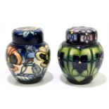 MOORCROFT; two ginger jars and covers, including an example decorated in the 'Violet' pattern,