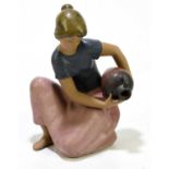 LLADRO; a figure of a kneeling girl with a water urn, number 2336, height 28cm.Condition Report: