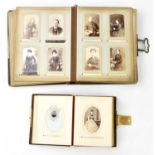Two Victorian leather bound family photgraph albums.